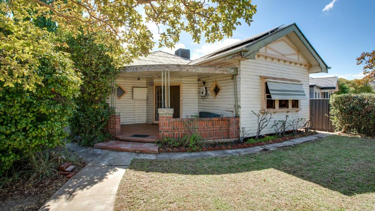 Almost original in condition this Wodonga home has some fantastic features such as beautiful polished floors throughout, three-metre ceilings with ornate cornices, timber sash windows, and picture rails. Picture supplied.