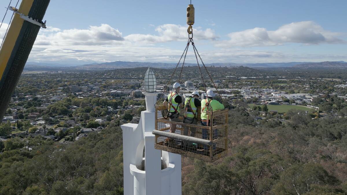 GALLERY: The views from Albury's Monument Hill as the team from Tonkin Group replace the globe in a rare event. Pictures supplied