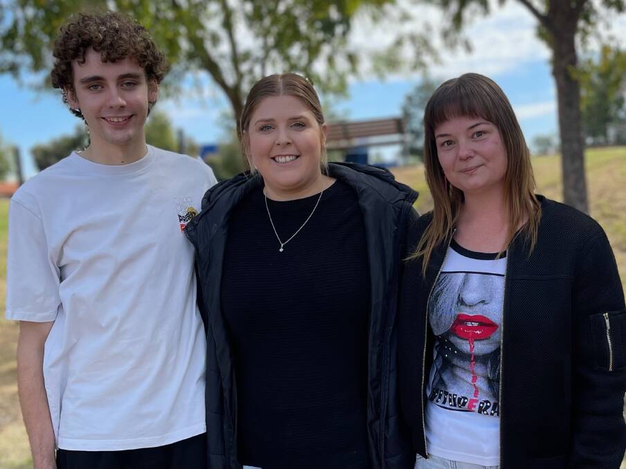 Cobram residents Jett Robbins, Ashleigh Ladgrove and Nicole Wells at Cobram's rally against gender-based violence. Picture supplied