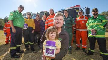 Roxette Percy, 2, and her granddad Andrew Pollard are asking the community to dig deep for the Good Friday Appeal. Picture by James Wiltshire