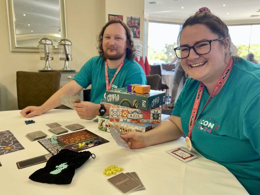 Dion Conibear and his partner Lyss Cole mean serious business when it comes to board games. Picture by Madilyn McKinley