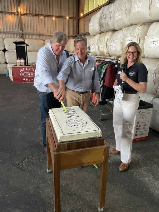 Jonathan and James Lillie, Fox and Lillie managing directors, cut the celebratory cake while Jenni Breddon, Corowa and districts regional manager, Fox and Lillie looks on at the opening of the wool store in Corowa. 