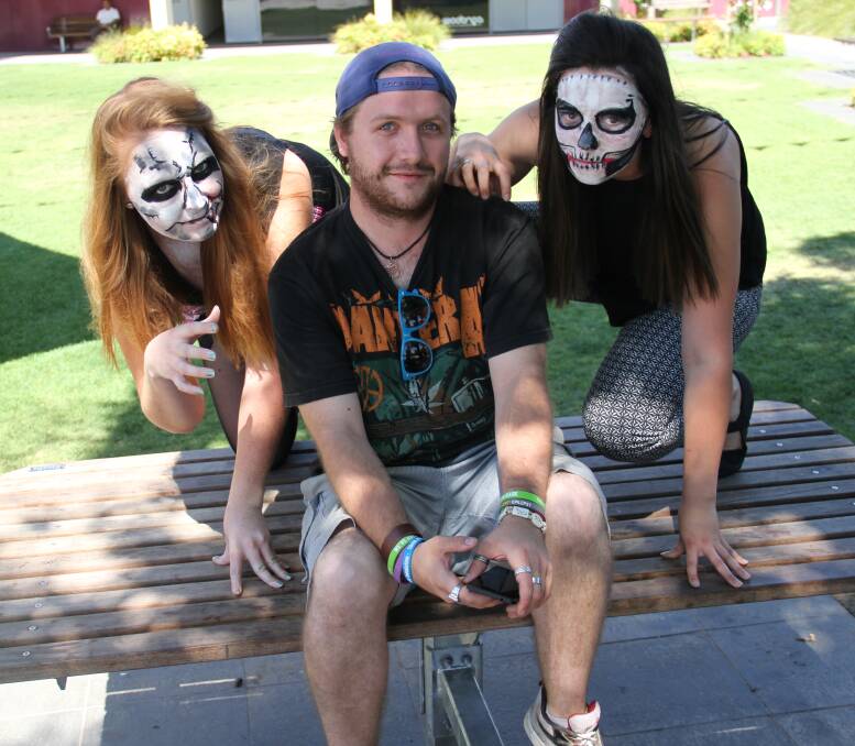 FREAKY: Zombies 'Coraline' and 'Banshee' spook an unsuspecting Ash Justin at The Cube ahead of Saturday's popular Zombie Walk hosted by Wodonga Council. Picture: DAVIS HARRIGAN