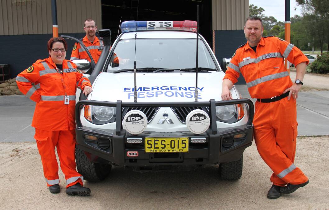 WORK: Stacey Parker, Deputy Controller Operations Tim Archer and Deputy Controller Rescue Shane Walters at Albury SES. Picture: DAVIS HARRIGAN