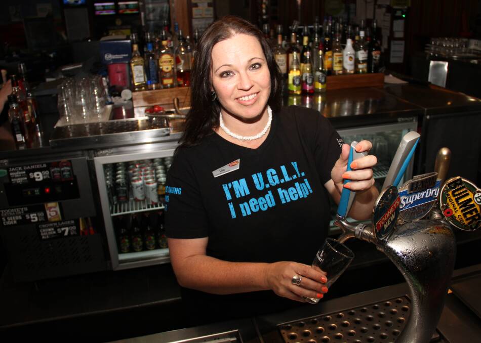 BAR QUEEN: Lisa Byatt of The Boomerang Hotel is raising funds for leukemia research through the UGLY campaign. Picture: DAVIS HARRIGAN