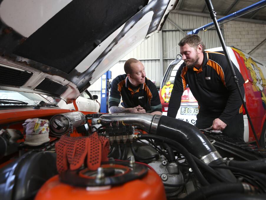 FRESH START: Gricey's Workshop owner Matt Grice and apprentice mechanic Ben Vicary have a shared passion for cars, which they both bring to their work.