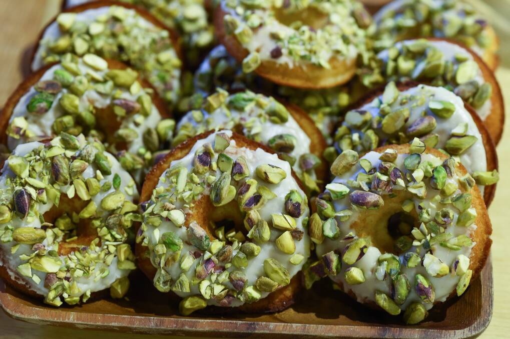 WHOLESOME APPROACH: Vegan-friendly iced doughnuts are a drawcard among sweets, cakes and bread baked on site at Yackandandah cafe Saint Monday.