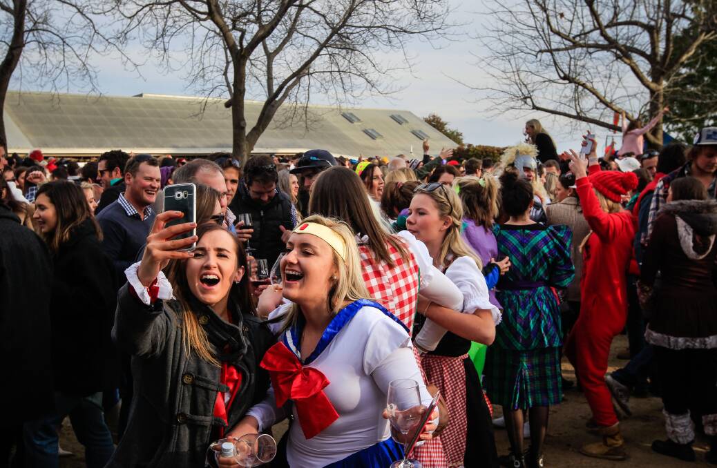 CROWD SHOT: Albury's Tamika Bailey and Sara Fairley take a picture in the crowd at the Rutherglen Winery Walkabout in 2015. Organisers expect another sell-out.