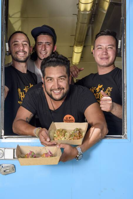 Los Hermanos Mexican Taqueria operators Bruno Carreto (front), Felipe Arias, Andres Lopez and Juan Duran feeding the lunch crowd at Yarrawonga Food Truck Carnival. Picture: SIMON BAYLISS