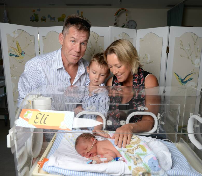 ELI MAKES FOUR: Thurgoona couple Simon Bayliss and Elenor Tedenborg with their son Charlie, 3, welcome Eli to the world ahead of schedule in Wodonga. Elenor will soon start treatment for breast cancer. Picture: MARK JESSER