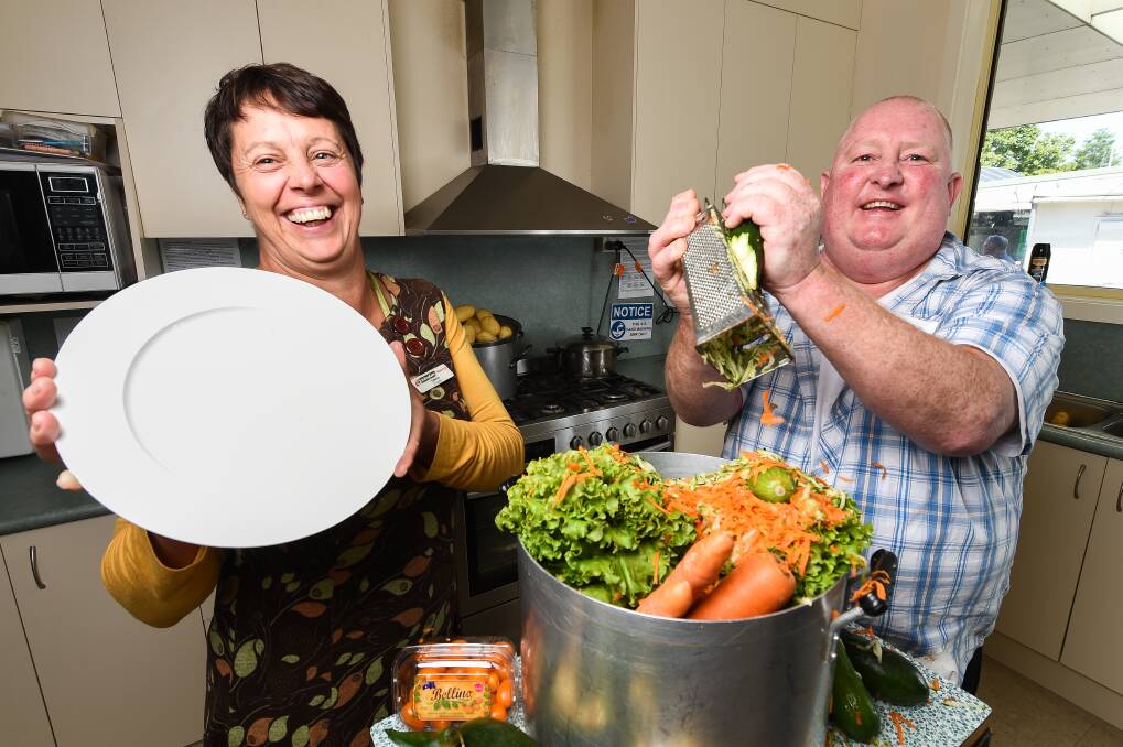 TAKING STOCK: UnitingCare Wodonga emergency relief coordinator Catherine Byrne and chef Shane Archer plan for the One Dish Restaurant in Wodonga on Friday. It's a collaboration with Wodonga TAFE. Picture: MARK JESSER