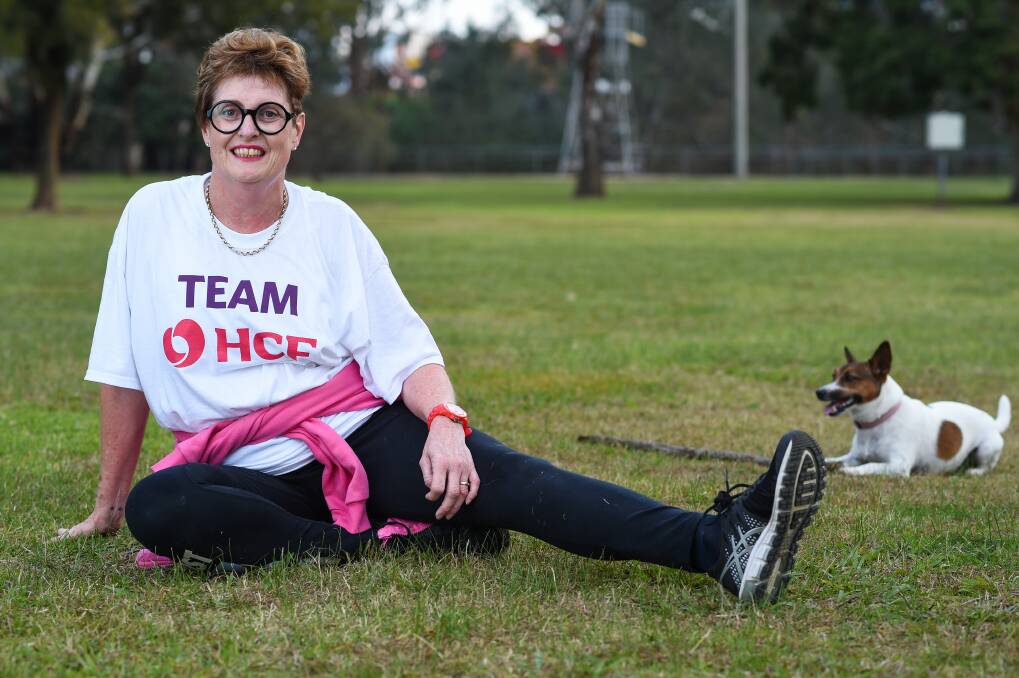 Yvonne Richards with her dog Charlie at Apex Park in Wangaratta. Picture: MARK JESSER