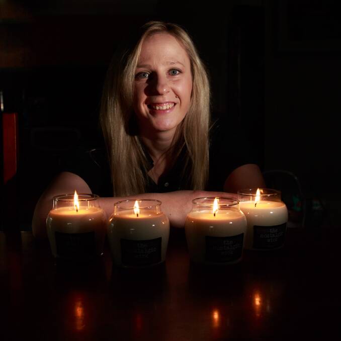 LIVING LIGHTLY: Thurgoona's Amy Everon is growing her small-batch, handmade, natural soy candle business The Nostalgic Wick while raising three children under three with her husband Matthew. Picture: SIMON BAYLISS