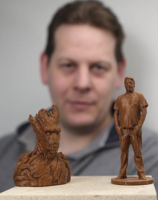 3D CREATIONS: Thurgoona hobbyist Joel Hackett, of 3D Things, with some of his 3D printed items made with plastic filament in his workshop. Pictures: ELENOR TEDENBORG