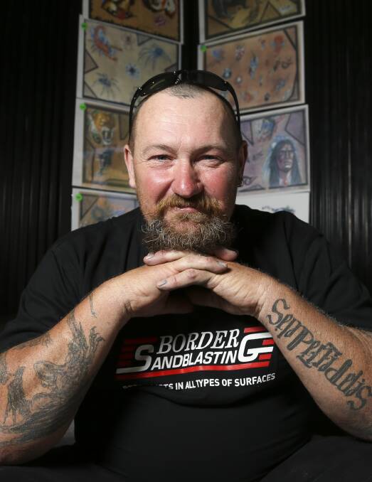 BIG HEART: Craig Nolan will have the Camp Quality logo Giggles tattooed to his foreman to raise money for the children's cancer service. Picture: ELENOR TEDENBORG