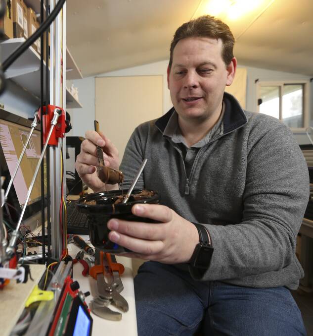 HOT CHOCOLATE: Joel Hackett is working on a 3D chocolate printer prototype, which is now up to its third modification. 