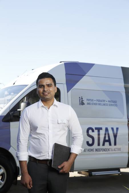 BUS STOP: Villa Maria Catholic Homes physiotherapist Ashutosh Porwal with the STAY bus, which will visit the region during the Henty Machinery Field Days.