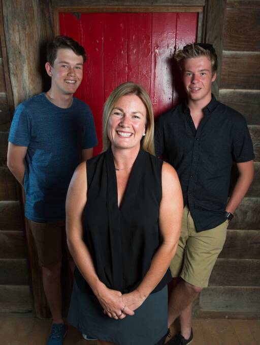 MUSICAL TRIO: Charlie Cooper, 16, Musikids owner Kathryn Pyle and Jack Woodman, 15, celebrate 10 years since Musikids opened on Gateway Island. Picture: MARK JESSER