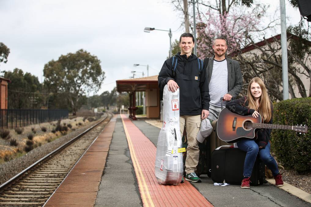 ON TRACK: Folk duo Oli Campbell-Craig and Lauren Diffey, both 17, with James Brookes, centre, arrive at Chiltern as part of an exchange program between Dreamfields and the Somerset Rural Youth Project. Picture: JAMES WILTSHIRE
