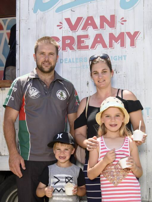 COOL CHANGE: Finley's Sam and Elyse Price with children Madelynn, 6, and Lincoln, 3, cool down with gelato at Yarrawonga Truck Food Carnival. Picture: SIMON BAYLISS
