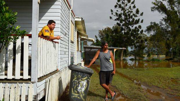 "We had nowhere to go:" Phillip Roberts (left) and Brandon Harrington (right) at their home on the banks of the Wilsons River at Wyrallah. Photo: Kate Geraghty