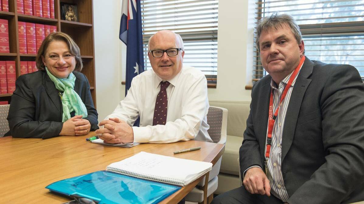 BACK ON TRACK: Sophie Mirabella, federal Arts Minister George Brandis and Wangaratta Jazz Festival chairman Paul Squires met in Canberra.