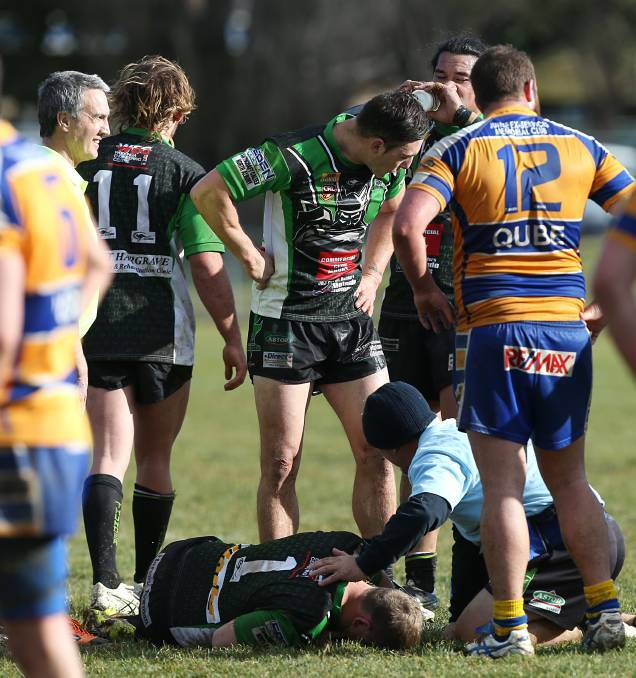 DOWN FOR THE COUNT: Thunder coach Ben Jeffery took no part in the match after receiving a knock to his rivals. Picture: JAMES WITHSHIRE