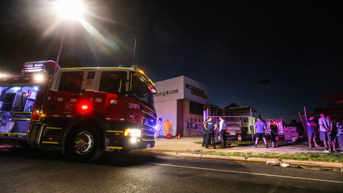 FAMILY BUSINESS: Firefighter were quick to respond to a blaze at Town and Country Timber Flooring in Wodonga, which caused significant damage on Saturday night. Picture: JAMES WILTSHIRE