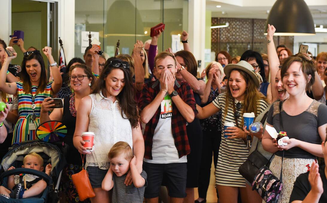 ALL THE EMOTIONS: Cr Kat Bennett,  Elysse Fagan, Jarryd Phillips and Tamsen Larsen were among the ecstatic people at Gateway Health when the same-sex marriage verdict was revealed. Picture: MARK JESSER