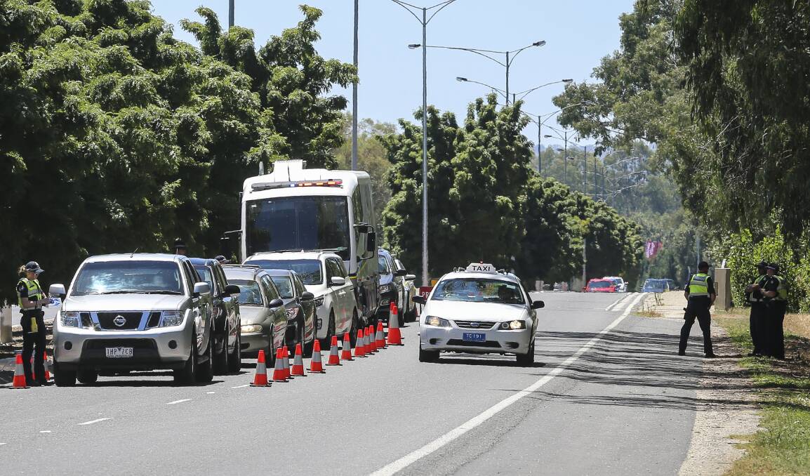 OUT IN FORCE: Police set up a random breath testing site on the Lincoln Causeway on Australia Day to catch drink and drug drivers. Picture: JAMES WILTSHIRE