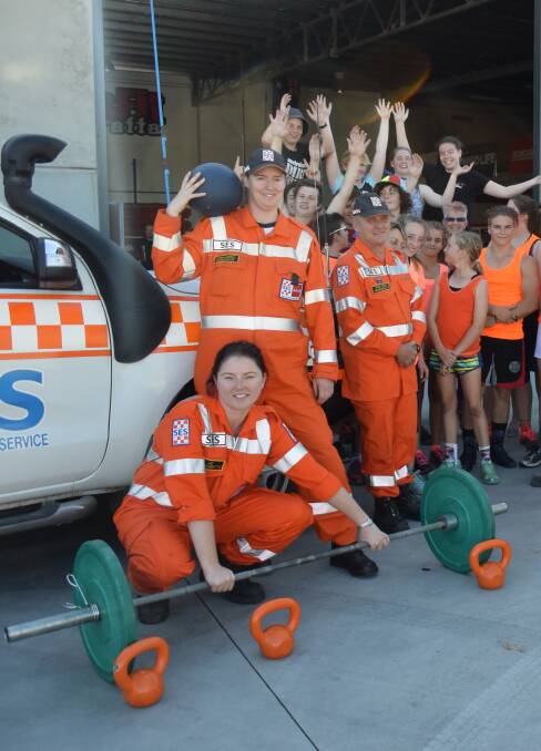 STRONG WORK: SES volunteers Liz Fraser, Carina Heppell and Paul Zuch are ready to work with some of the CrossFit Wangaratta members. Picture: SHANA MORGAN