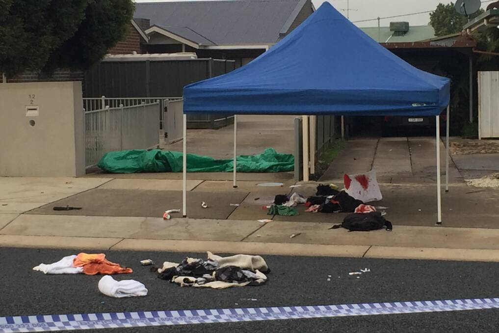 CRIME SCENE: The bloody aftermath of the brawl on White Street, where Wangaratta man Russell Berry died. 