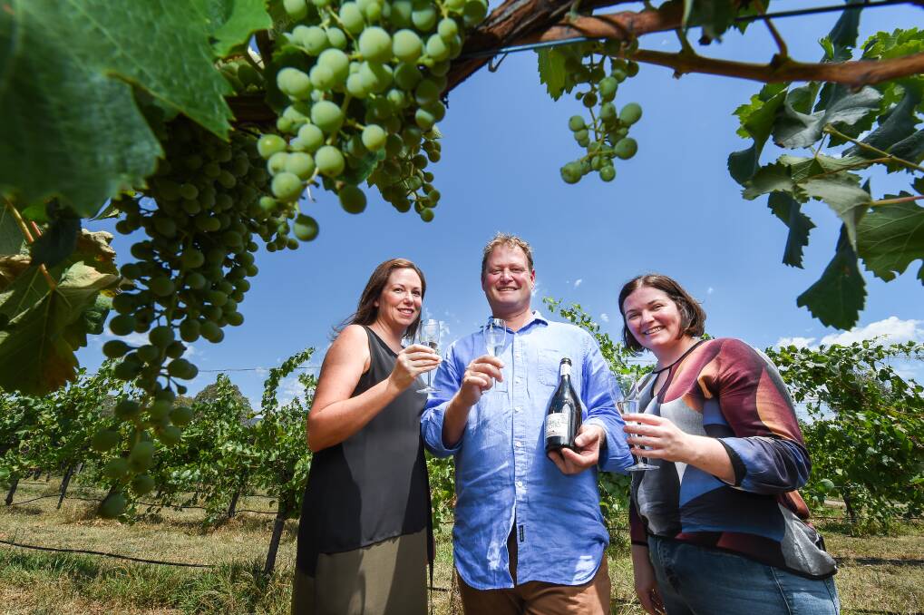 BACKING THE KING VALLEY: Northern Victoria MP Jaclyn Symes, Michael Dal Zotto and Rural and Regional Australia Shadow Assistant Minister Lisa Chesters under the prosecco grapes. Pictures: MARK JESSER