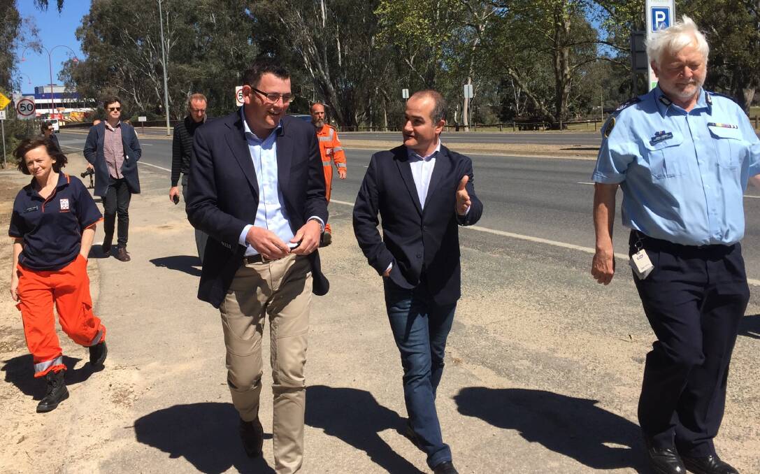 SPECIAL VISITORS: Premier Daniel Andrews and Emergency Services Minister James Merlino visited the leaking Parfitt Road levee on Thursday.