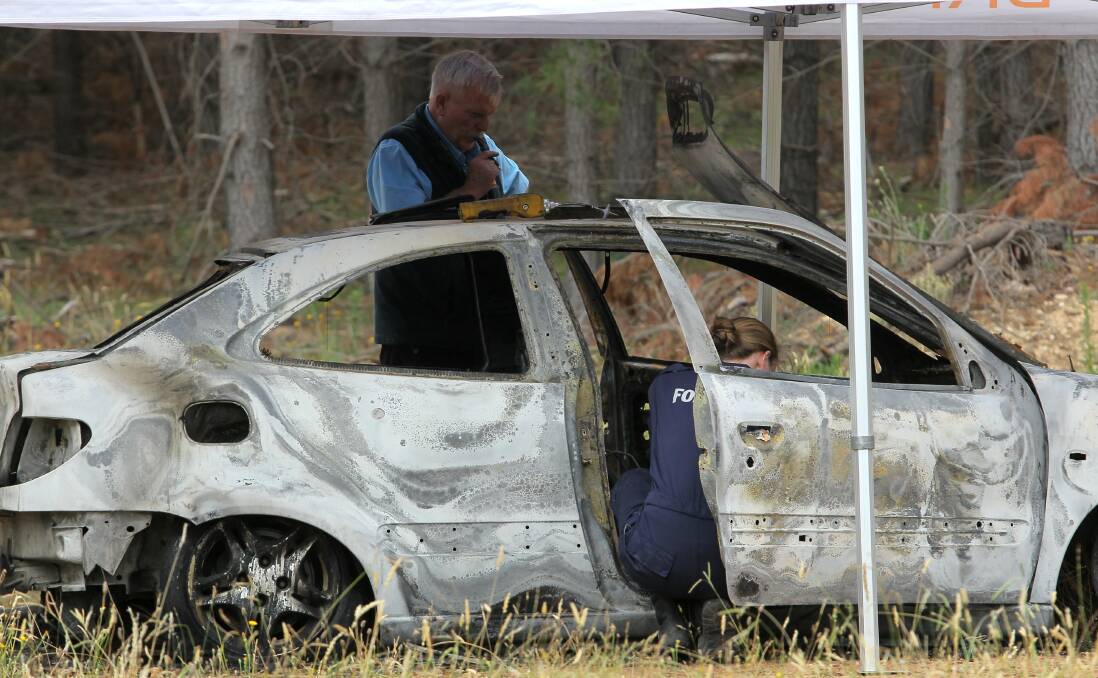 HOW IT STARTED: Investigations were launched into the disappearance of Karen Chetcuti when her red Citroen was found burnt out in Myrtleford on January 14 last year. Her body would not be recovered for another four days.