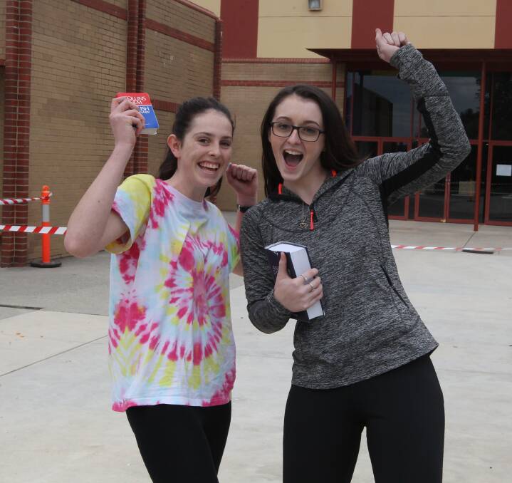 ONE DOWN, FIVE TO GO: Jaymee McKelvey and Madie Davies had their dictionaries ready for Wednesday's three-hour English exam at Wodonga Catholic College, which they happily conquered. Picture: SHANA MORGAN