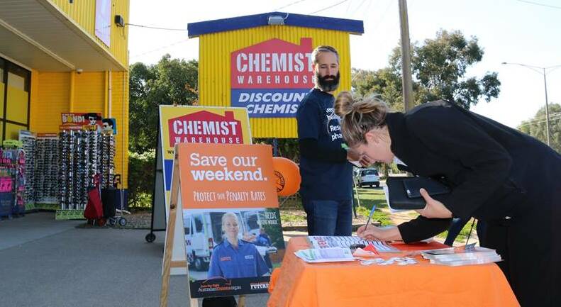 GATHERING SUPPORT: The Victorian Trades Hall Council and Professional Pharmacists Australia were at Chemist Warehouse in Wangaratta this month to talk about penalty rates.