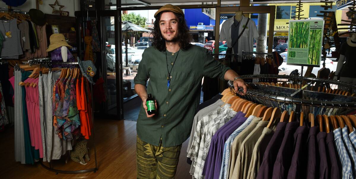 ALL NATURAL: Sam Hamilton from Albury's Eco Store loves his hemp oil and clothing and is ready for a busy day of customers when the shop opens its doors on Boxing Day. Picture: MARK JESSER