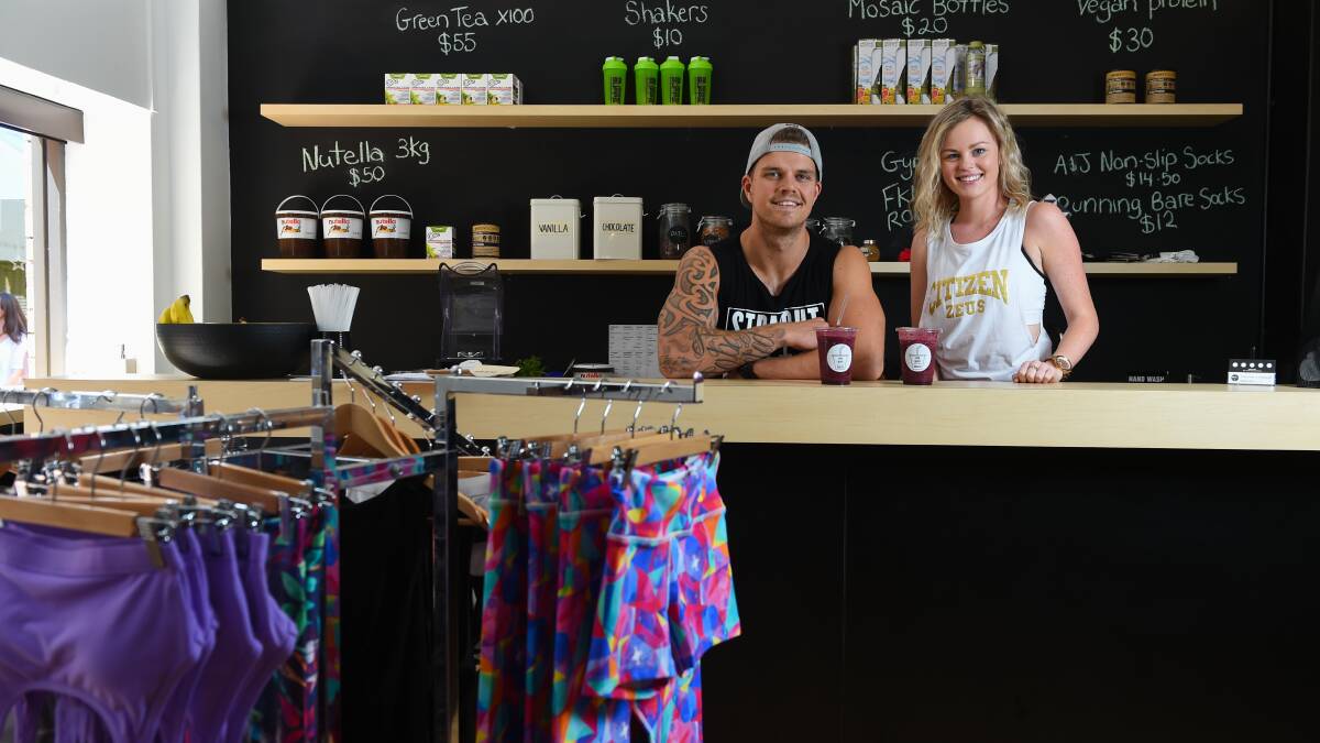 HOLIDAY HEALTH: Gym Depot Clothing Co.'s Rhys Mildren and Jess Mastenbroek are ready for the madness of Boxing Day. Picture: MARK JESSER