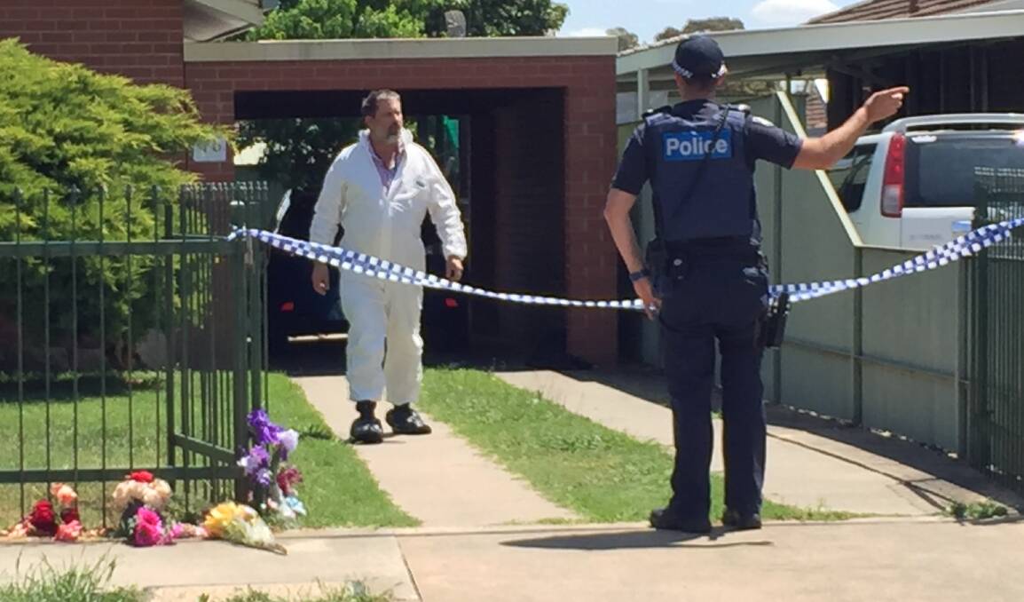 ANOTHER TRAGEDY: Police investigators at the home of schoolgirl Zoe Buttigieg after her death in October last year. They gathered evidence to charge her alleged killer.