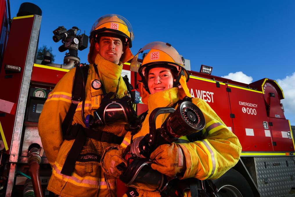 NEW TOY: Wodonga West volunteer firefighters Jakeb French and Jade Dessent are happy - their brigade has been approved for a $7667 Victorian government grant to purchase a new thermal imaging camera. Picture: MARK JESSER