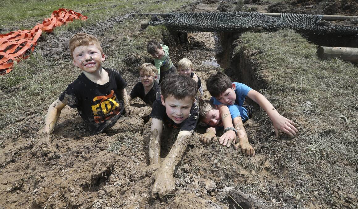 COURSE TESTERS:  Murray Ellis, 5, and Rory Gibb, 6, led the way out of a trench built at Oxley Recreation Reserve. Picture: ELENOR TEDENBORG