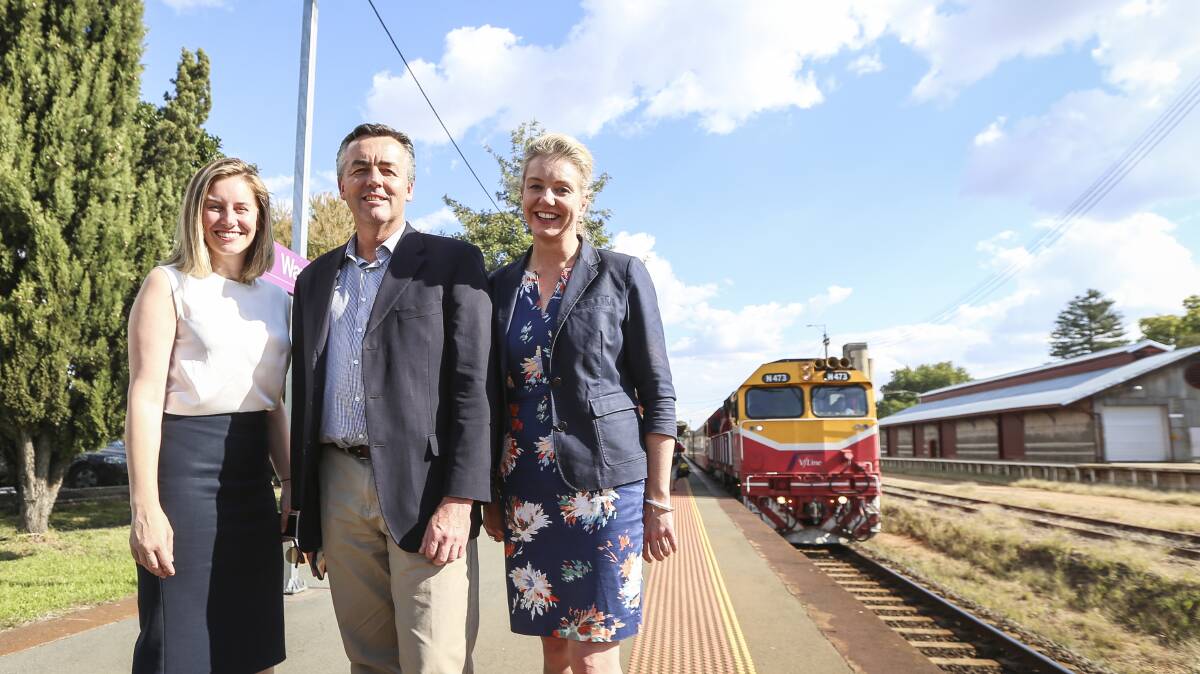 ALL ABOARD: Steph Ryan, Darren Chester and Bridget McKenzie catching the train from Wangaratta on Monday. Picture: JAMES WILTSHIRE