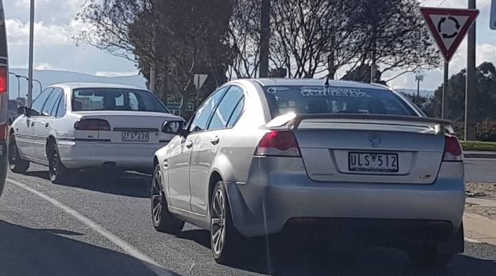 DO YOU KNOW THESE CARS?: Police have released an image of a Toyota Lexcen and silver VE Holden Commodore. 