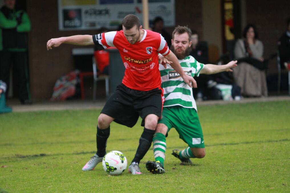 TOUGH STUFF: Boomers had the upper hand against Albury United. Pictures: SHANA MORGAN