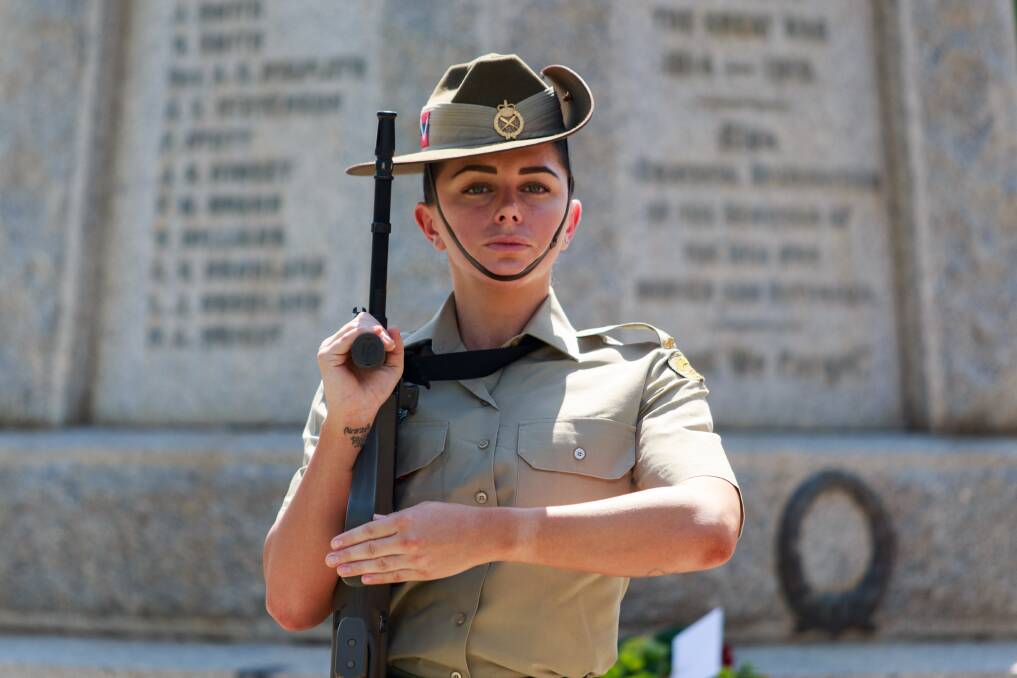 LEST WE FORGET: Wreaths were laid at the base of the Wodonga cenotaph for Remembrance Day. Pictures: SIMON BAYLISS
