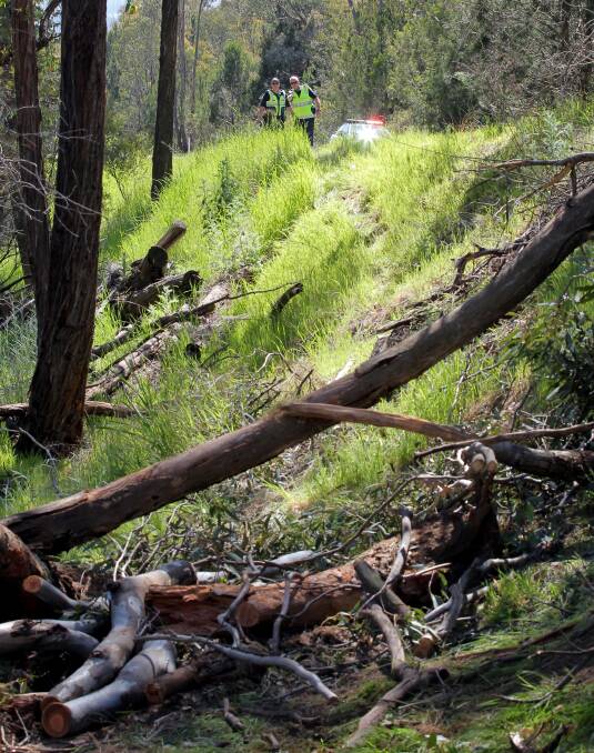 HIGH-RISK ROAD: Police examined the scene of a Beechworth-Wodonga Road crash in 2014 which resulted in the death of Wangaratta teenager Ty Robinson.
