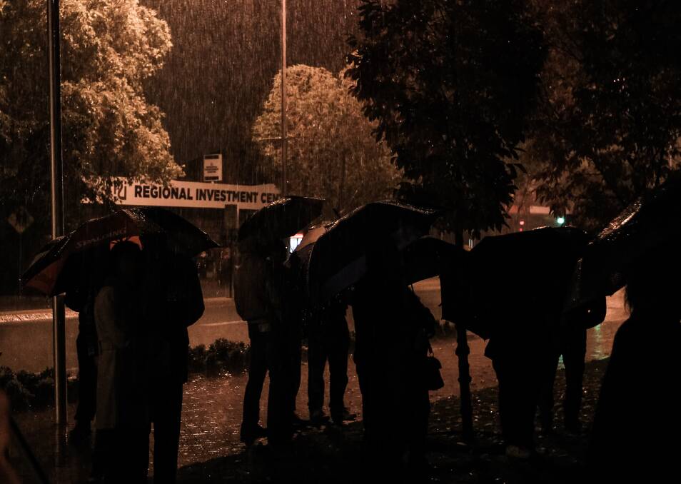 COMMITMENT: Wodonga's 100th anniversary Anzac Day services of 2015 began with cracks of thunder and heavy rain.