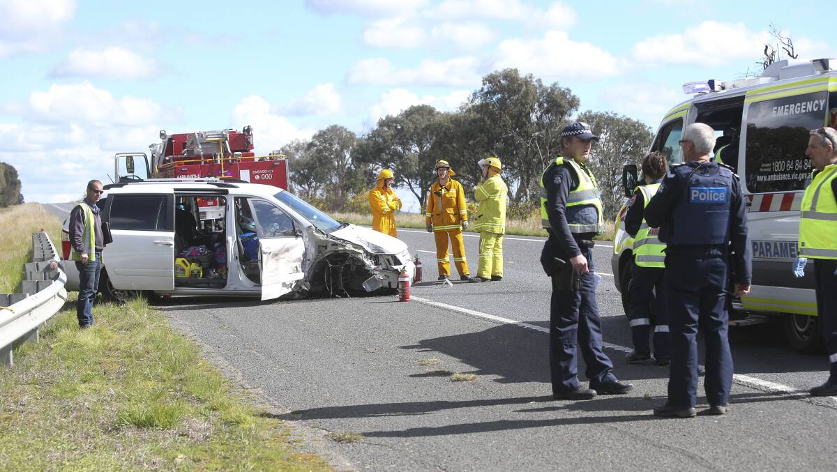 AVOIDABLE CRASH: Southbound lanes of the Hume Freeway near Barnawartha were closed for about an hour on Thursday as police, firefirefighters and paramedics dealt with a two-car collision. Pictures: ELENOR TEDENBORG