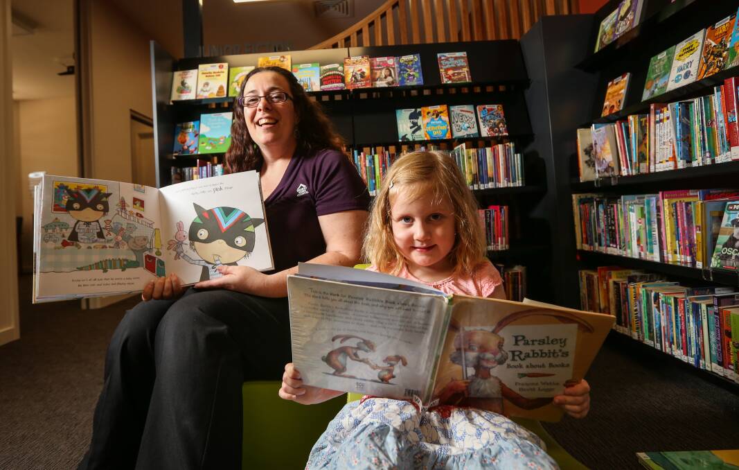 HAPPY READERS:  Beechworth Library coordinator Lauren Kelly and Beatrix Niedra, 4.